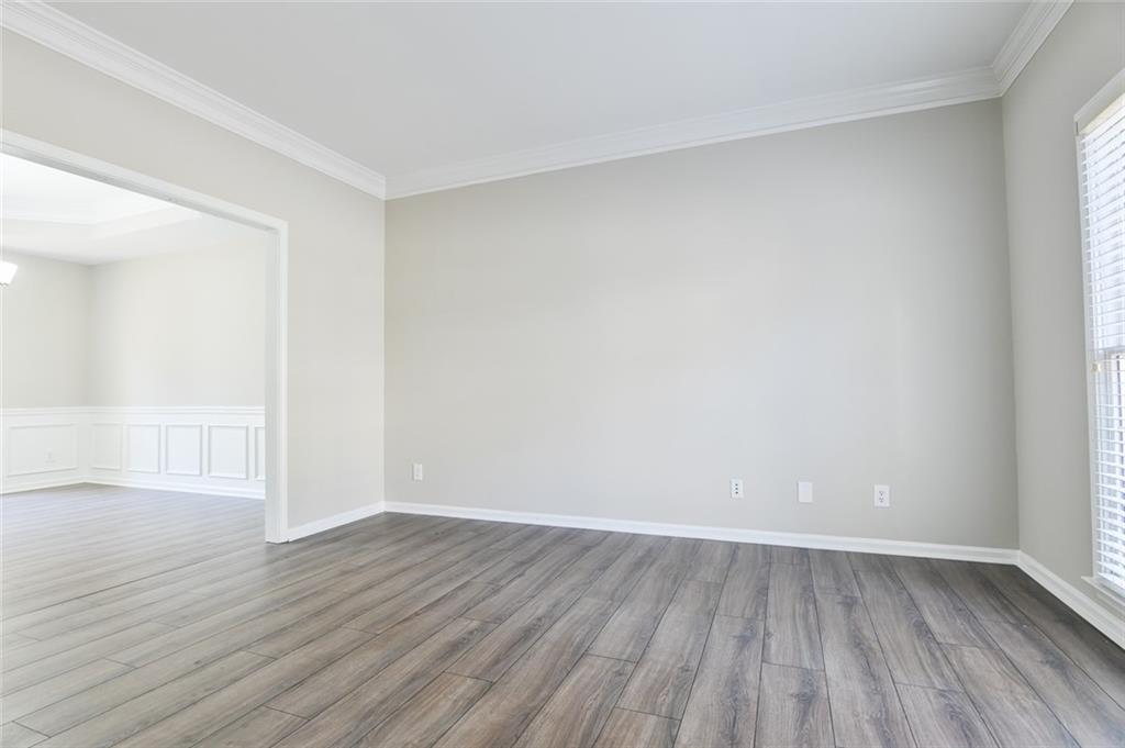 2670 Factor Walk Boulevard Suwanee, GA 30024 - Photo 19 of 57 a view of an empty room with wooden floor
