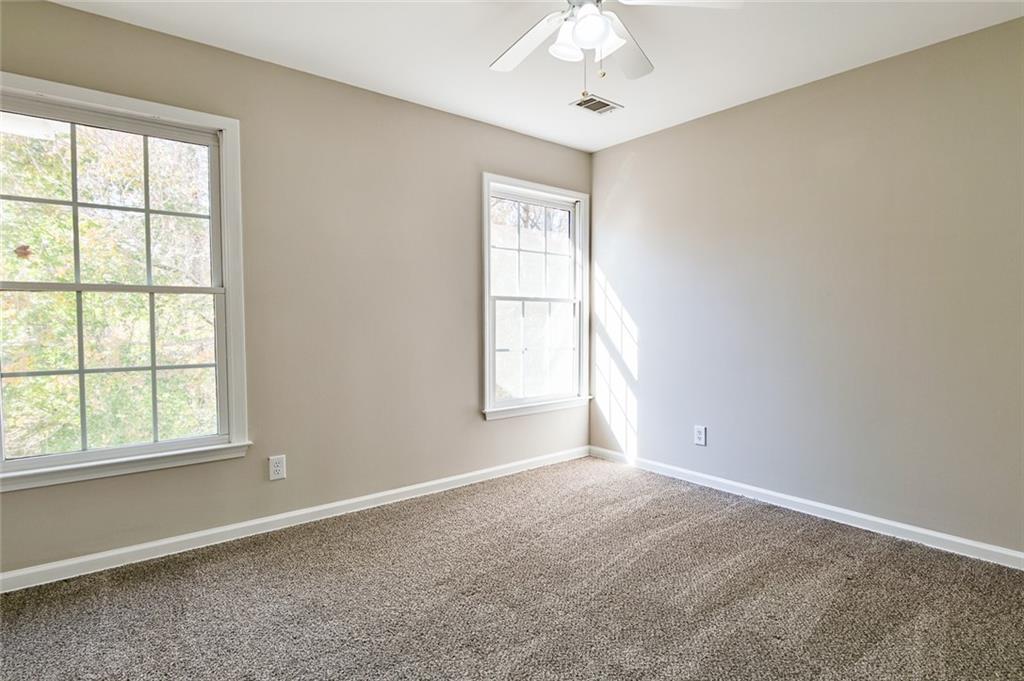 2670 Factor Walk Boulevard Suwanee, GA 30024 - Photo 31 of 57 a view of an empty room with a window