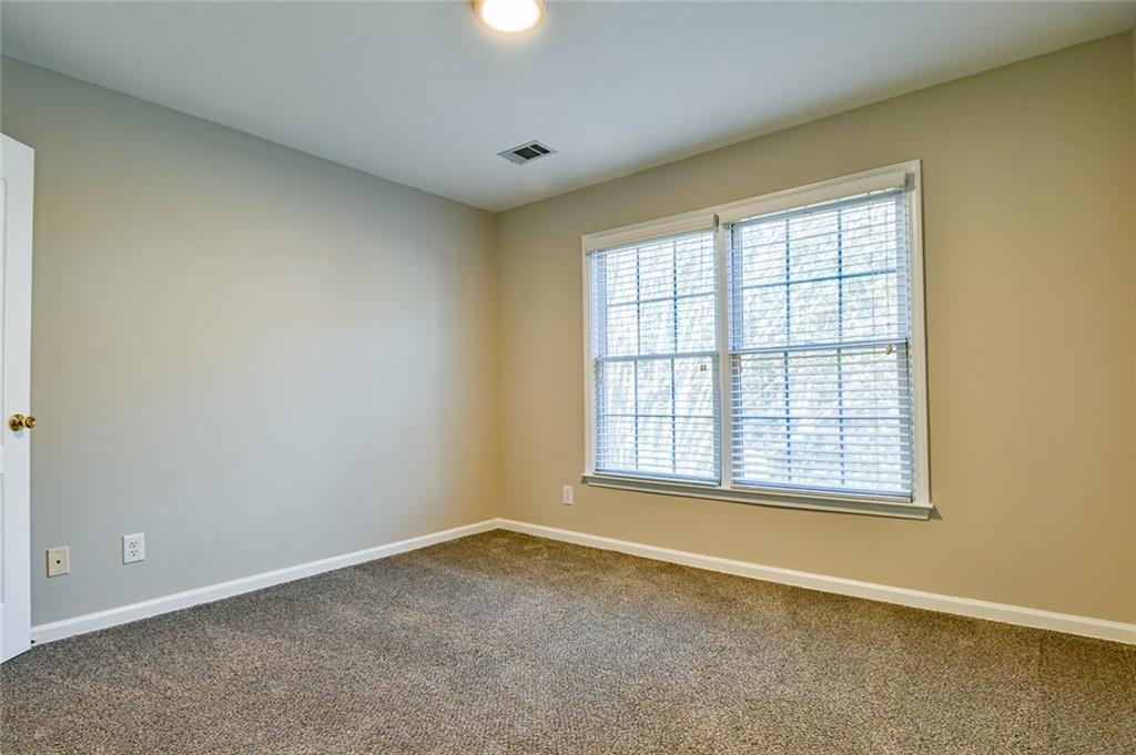 2670 Factor Walk Boulevard Suwanee, GA 30024 - Photo 33 of 57 an empty room with a window