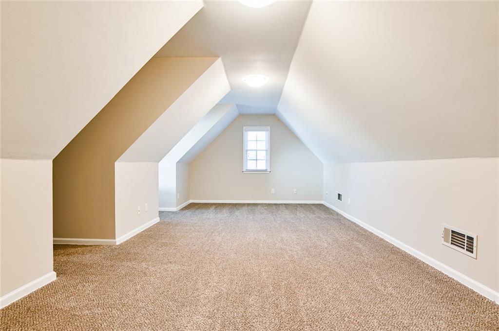 2670 Factor Walk Boulevard Suwanee, GA 30024 - Photo 34 of 57 a view of a big room with windows