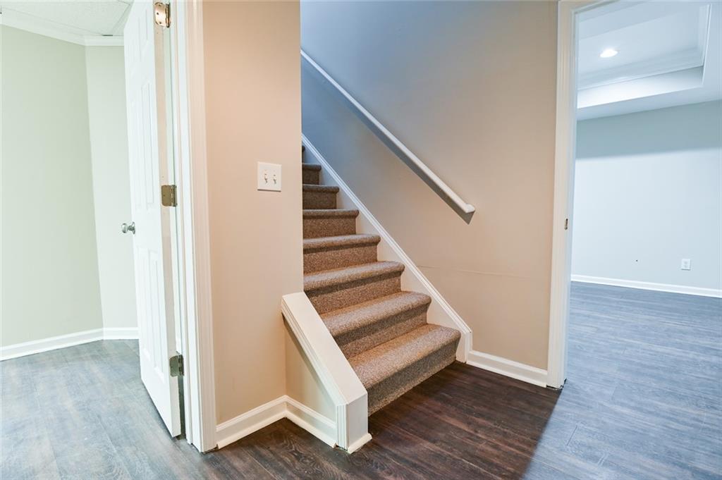 2670 Factor Walk Boulevard Suwanee, GA 30024 - Photo 39 of 57 a view of entryway and hall with wooden floor