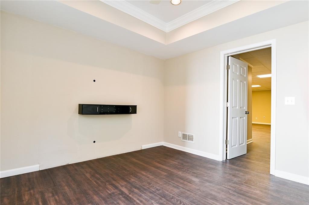 2670 Factor Walk Boulevard Suwanee, GA 30024 - Photo 41 of 57 a view of an empty room with wooden floor