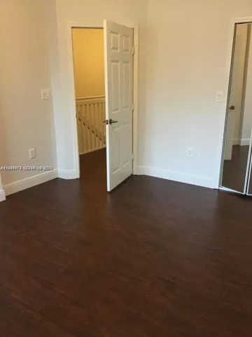 a bathroom with a glass door