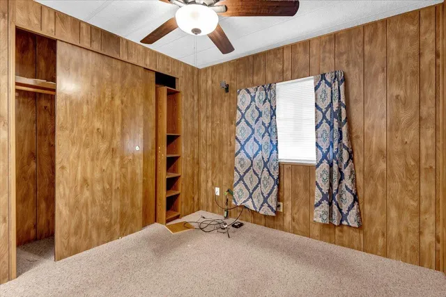 a view of an entryway with a wall