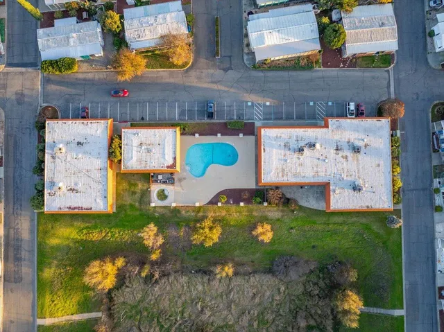 an aerial view of residential house with outdoor space