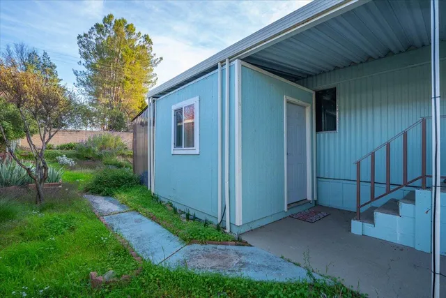 a backyard of a house with lots of green space