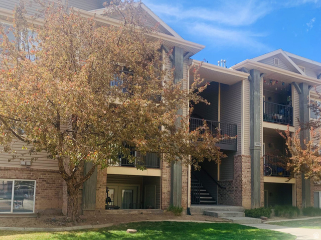 View of apartment building / complex with stairway
