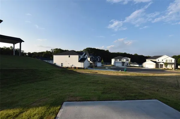 a view of a lake with a big yard