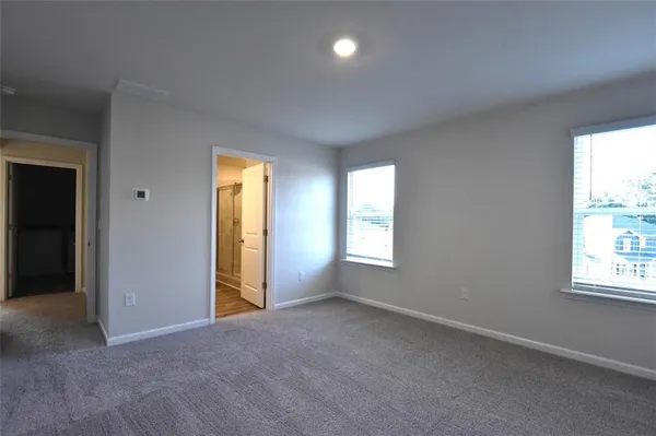 an empty room with windows