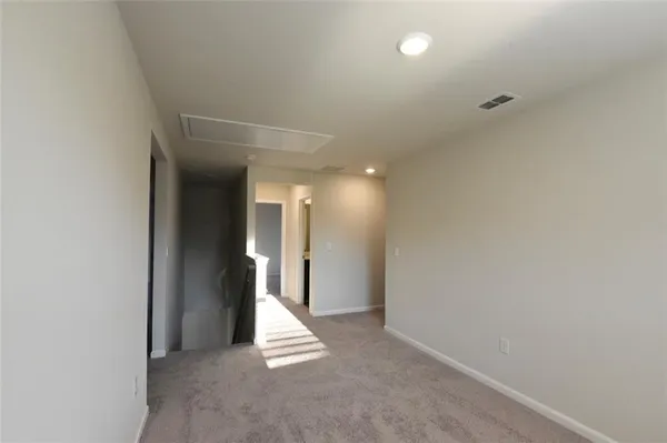 an empty room with an entryway