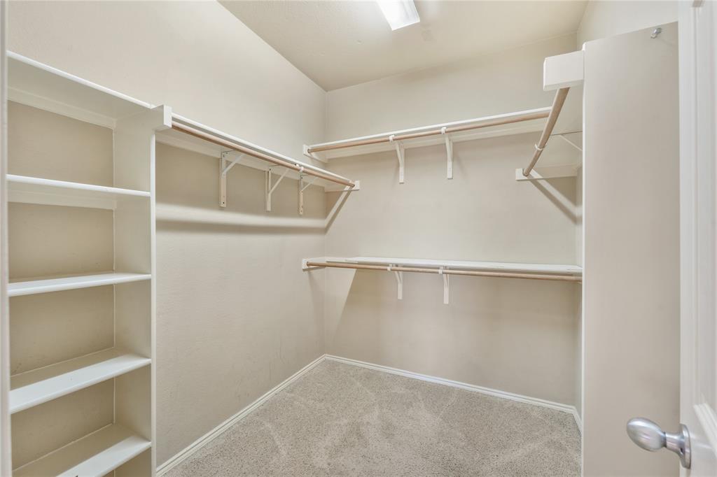 2003 Diamondback Forney, TX 75126 - Photo 17 of 30 Walk in closet featuring carpet floors