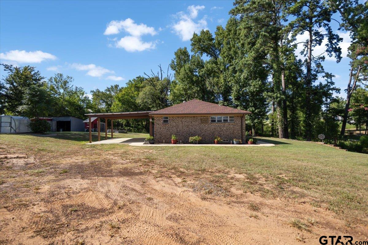 2855 County Road 1310 Rusk, TX 75785 - Photo 34 of 49 Side View of Home and Carport