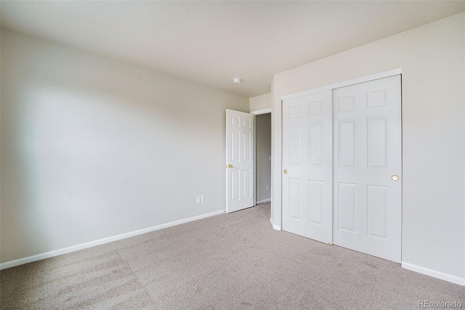 4623 Flower Street Wheat Ridge, CO 80033 - Photo 16 of 23 a view of an empty room