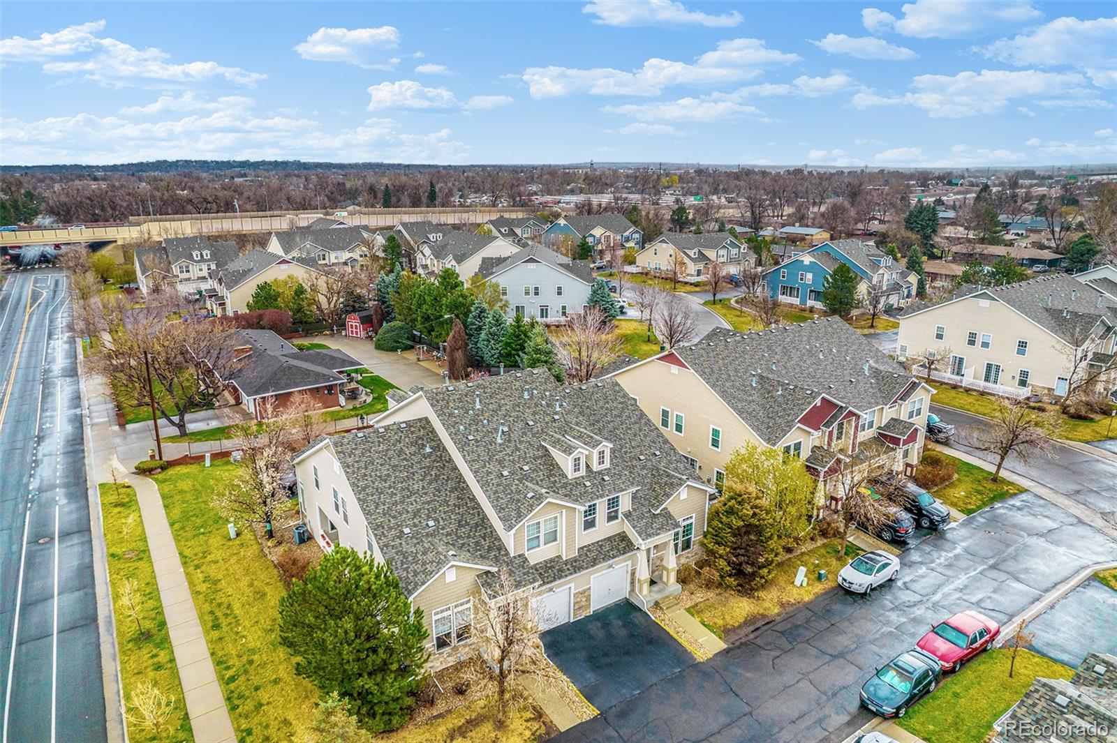 4623 Flower Street Wheat Ridge, CO 80033 - Photo 21 of 23 an aerial view of residential houses with outdoor space
