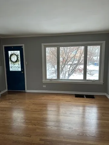 a view of a room and window