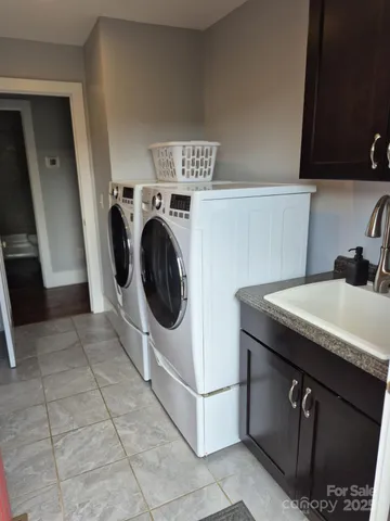 a utility room with dryer and washer