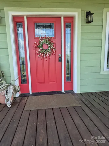 a view of a balcony with door