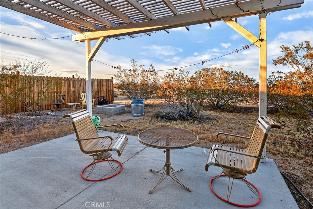 437 Mallow Road Landers, CA 92285 - Photo 26 of 52 a living room with patio furniture