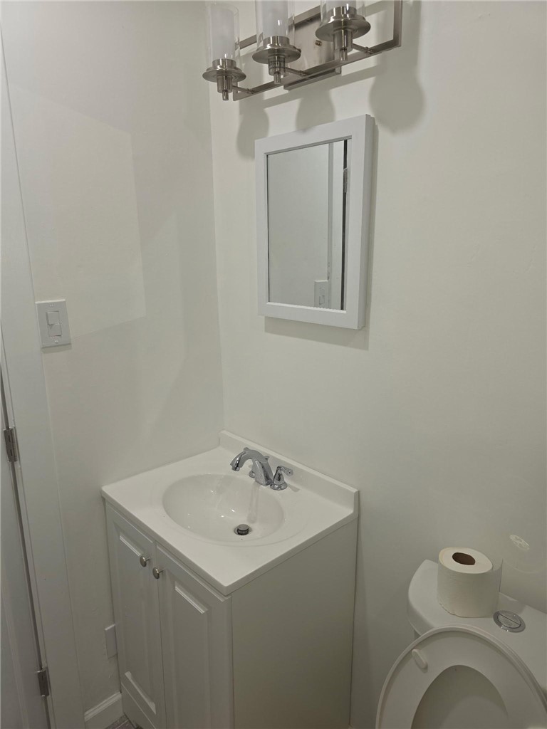512 E Street Needles, CA 92363 - Photo 20 of 20 a bathroom with a sink and a toilet