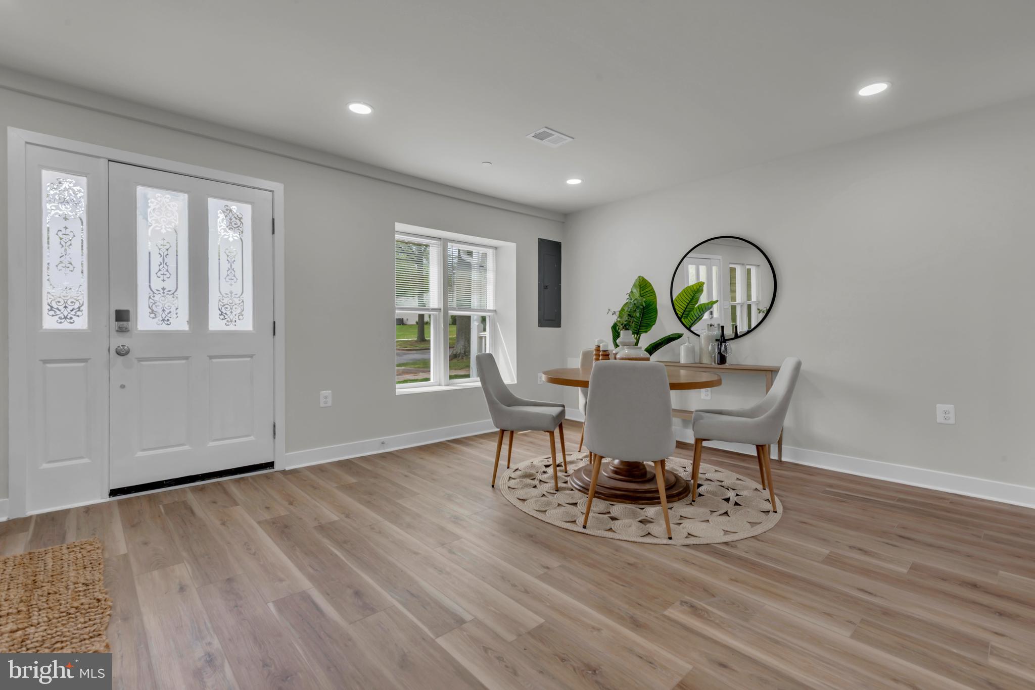 928 Riversedge Circle Annapolis, MD 21401 - Photo 11 of 37 a view of a dining room with furniture window and wooden floor