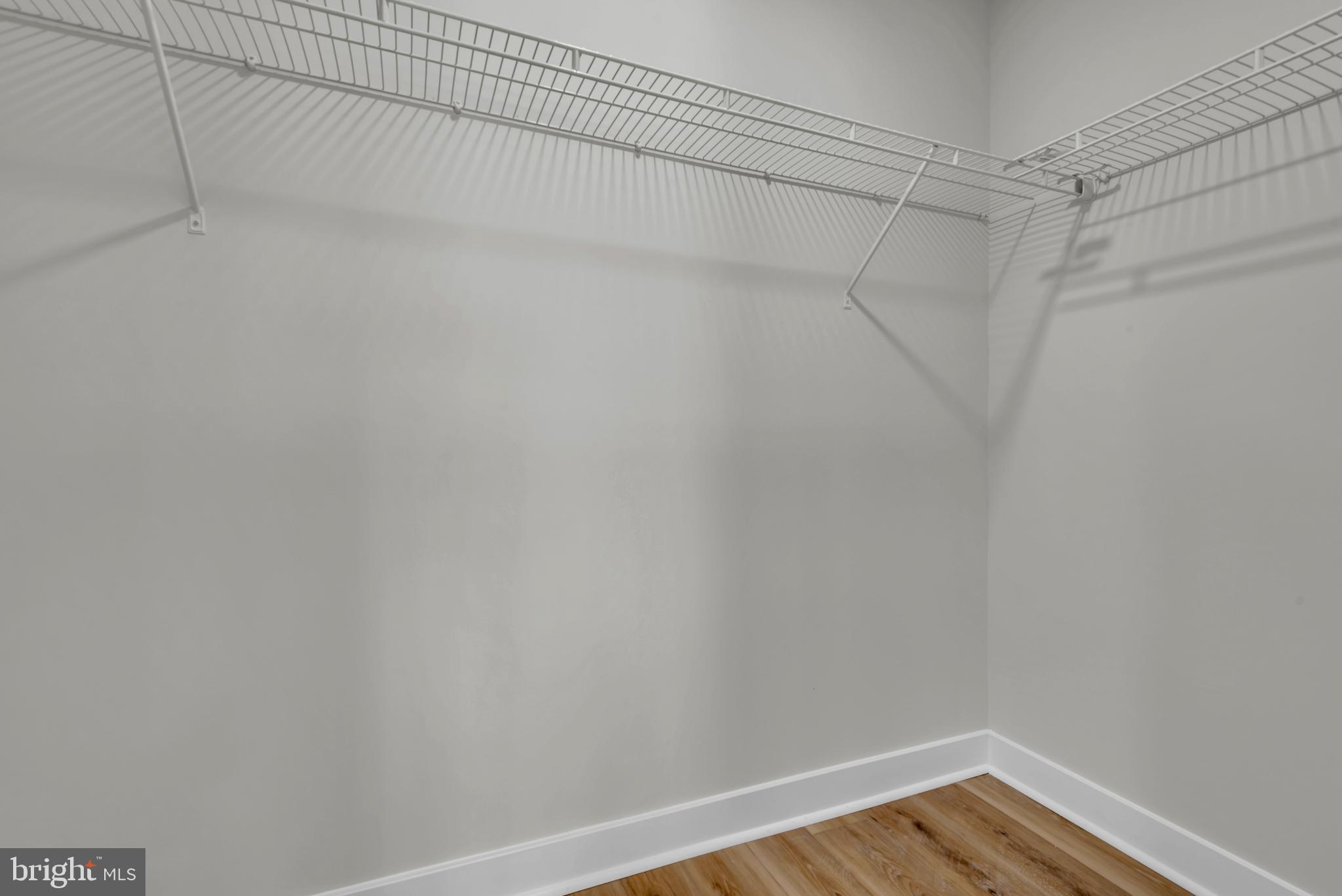 928 Riversedge Circle Annapolis, MD 21401 - Photo 26 of 37 a view of a room with racks on the wall