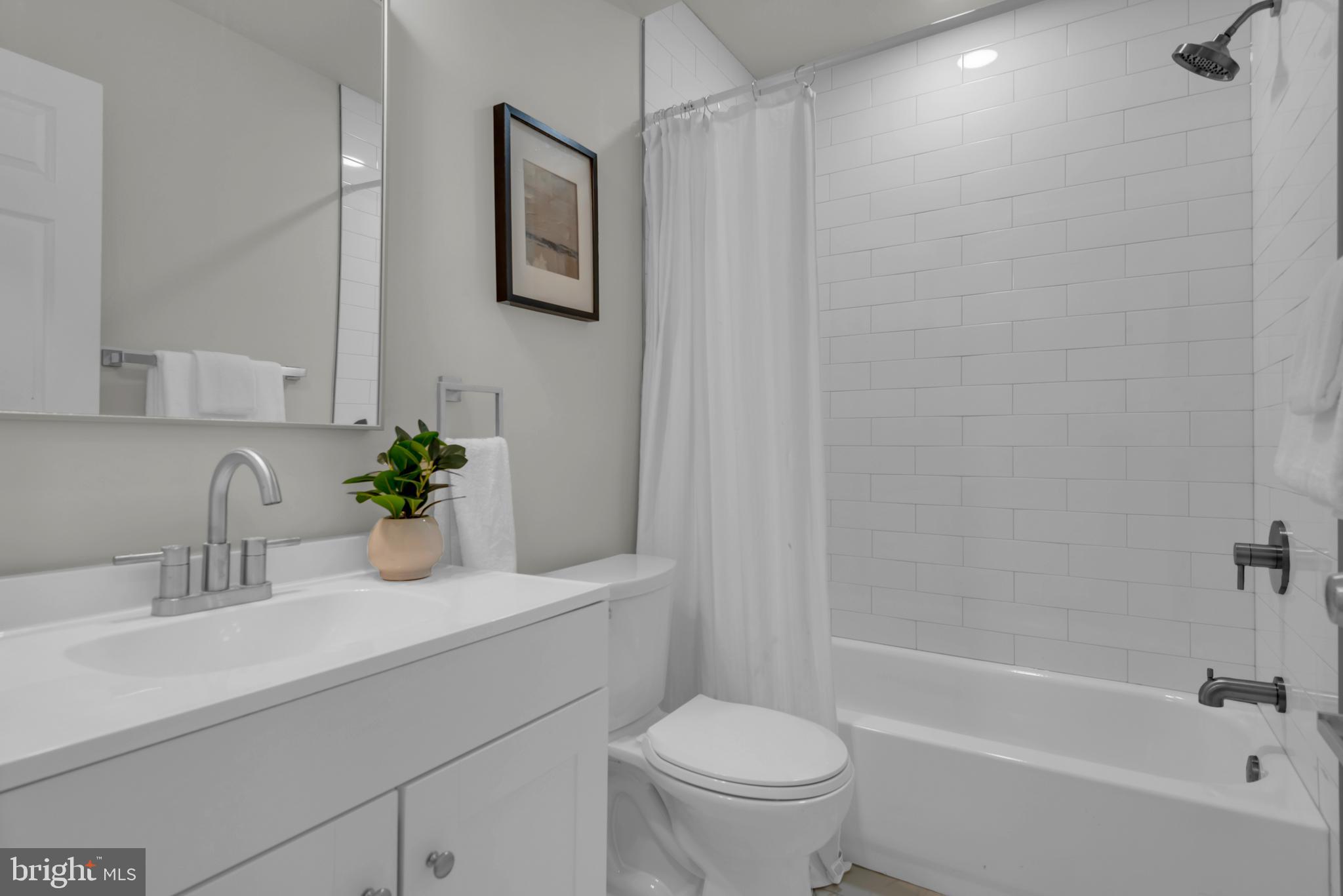 928 Riversedge Circle Annapolis, MD 21401 - Photo 27 of 37 a bathroom with a sink a toilet and shower