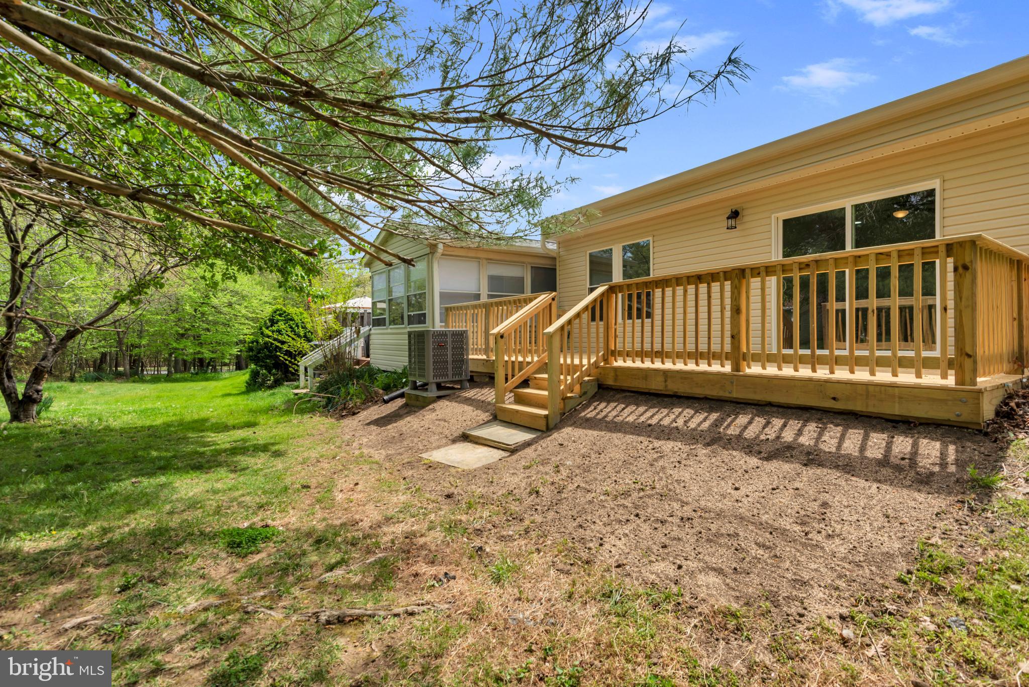 928 Riversedge Circle Annapolis, MD 21401 - Photo 33 of 37 a view of a house with a wooden deck