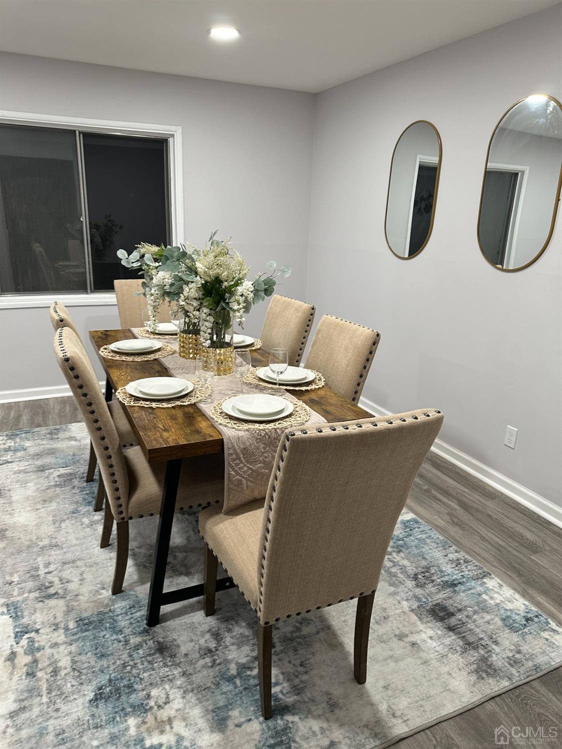 45 Raleigh Road Kendall Park, NJ 08824 - Photo 6 of 13 a view of a dining room with furniture