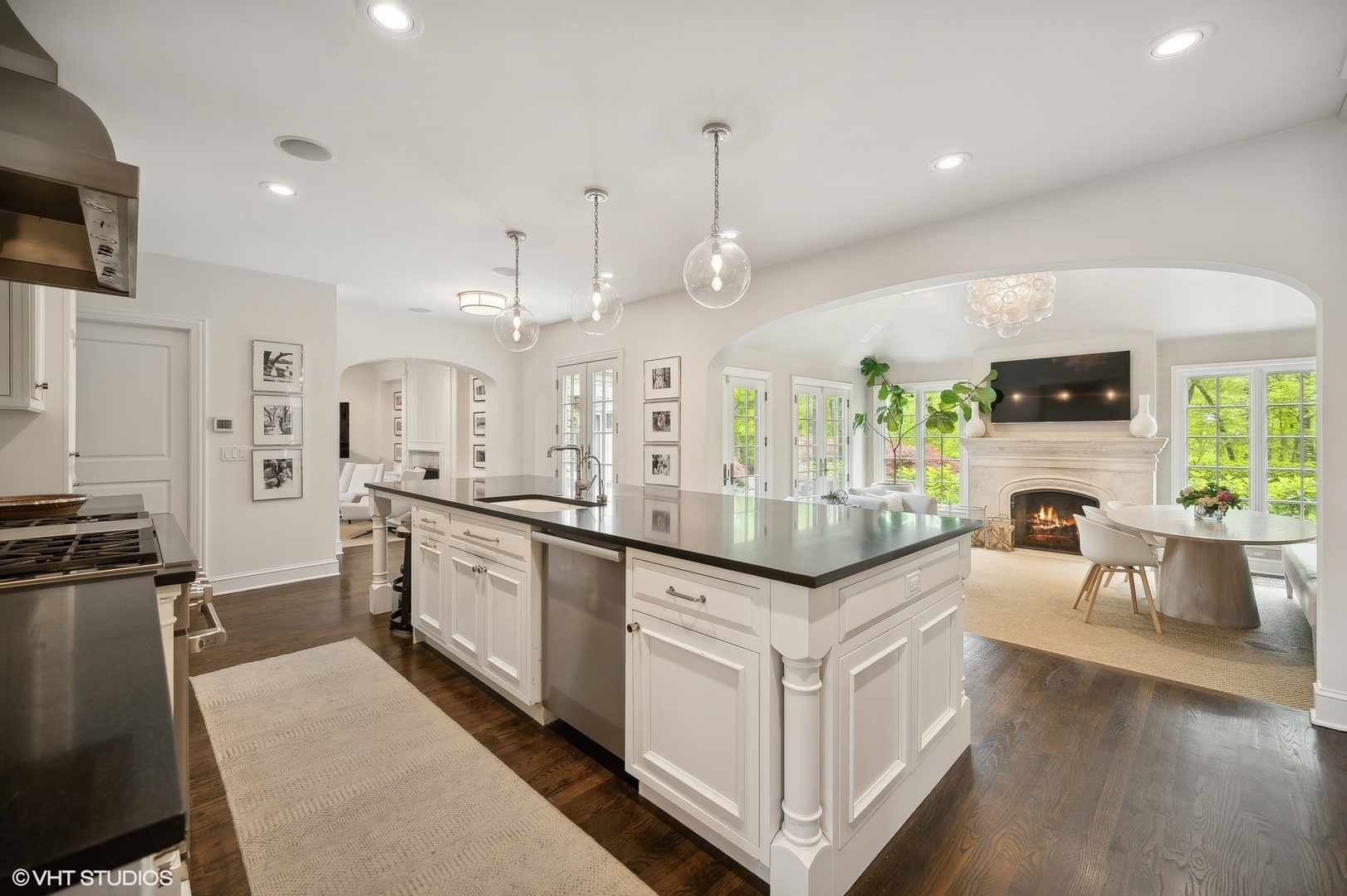 851 Sheridan Road Winnetka, IL 60093 - Photo 19 of 66 a large kitchen with kitchen island a large counter top space a sink stainless steel appliances and cabinets