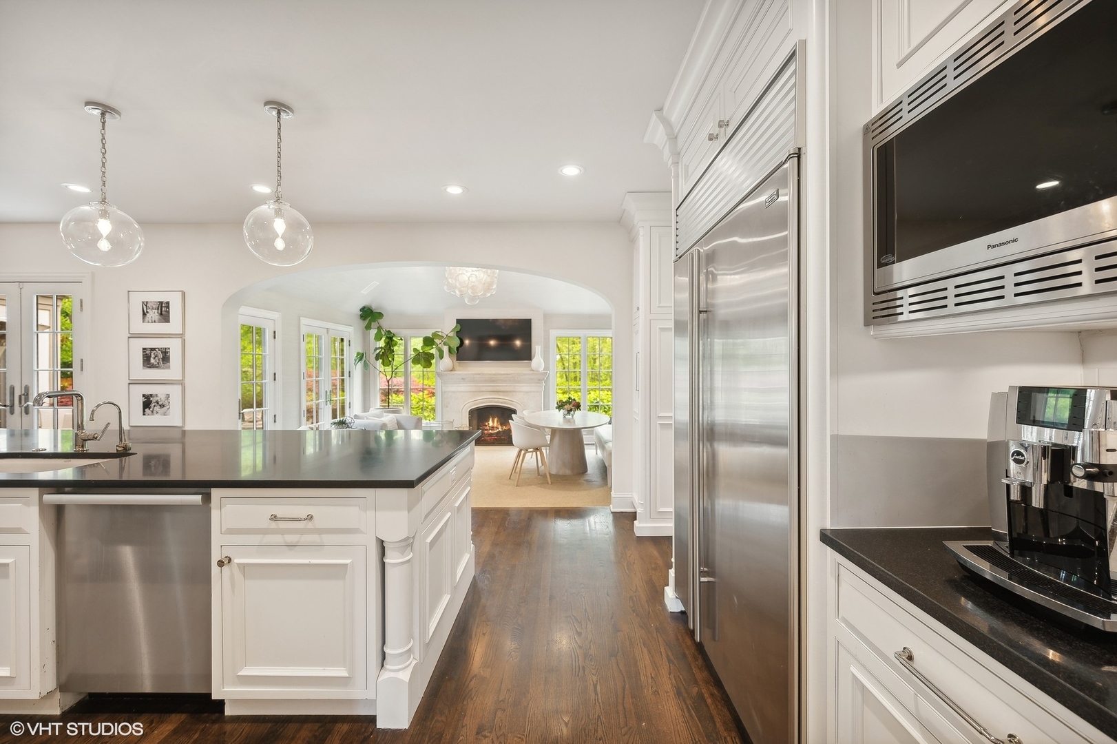 851 Sheridan Road Winnetka, IL 60093 - Photo 22 of 66 a kitchen with kitchen island white cabinets and stainless steel appliances