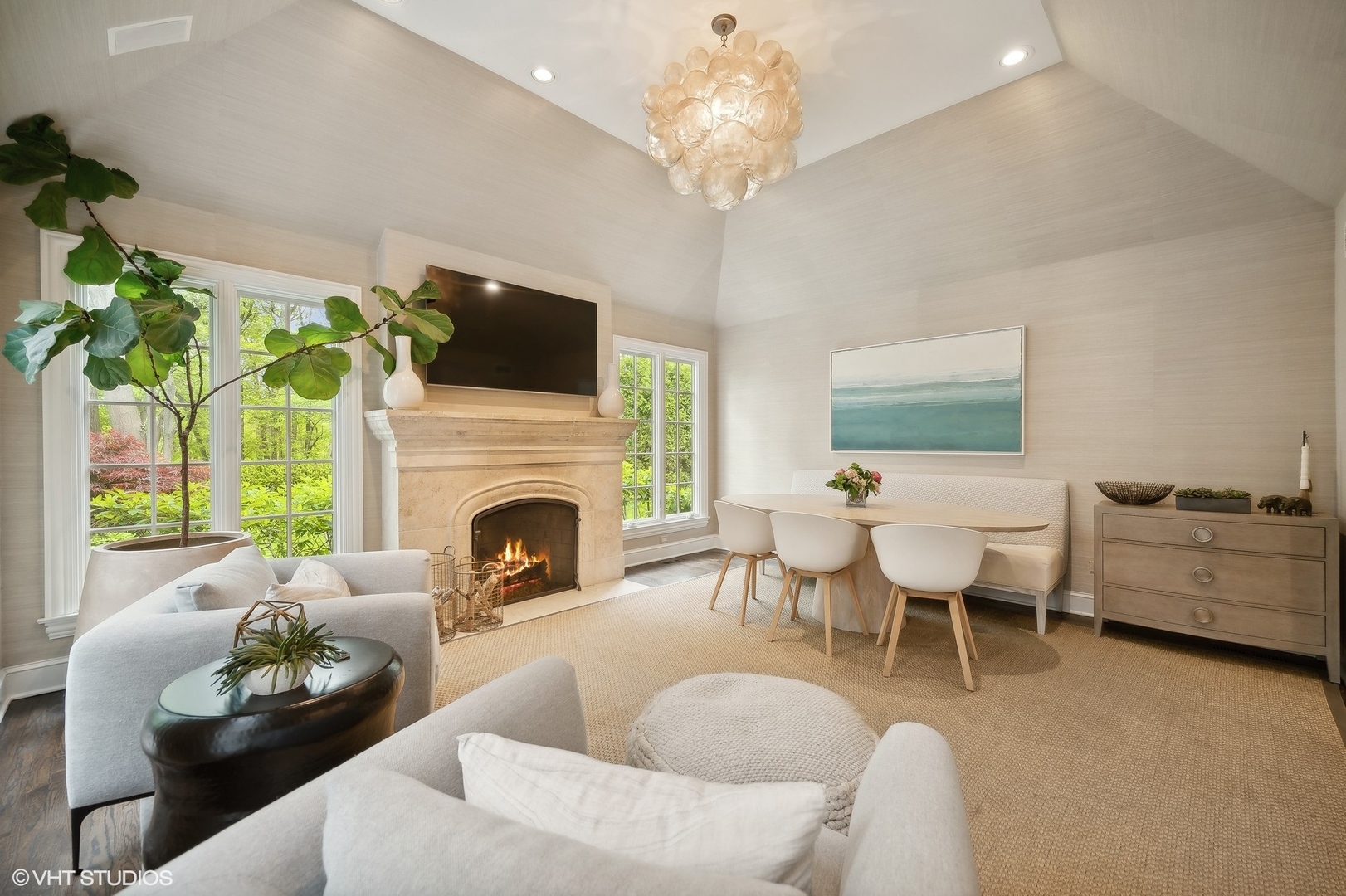 851 Sheridan Road Winnetka, IL 60093 - Photo 26 of 66 a living room with furniture a fireplace and a flat screen tv