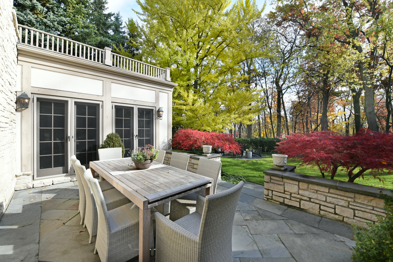 851 Sheridan Road Winnetka, IL 60093 - Photo 31 of 66 a view of a house with backyard and sitting area