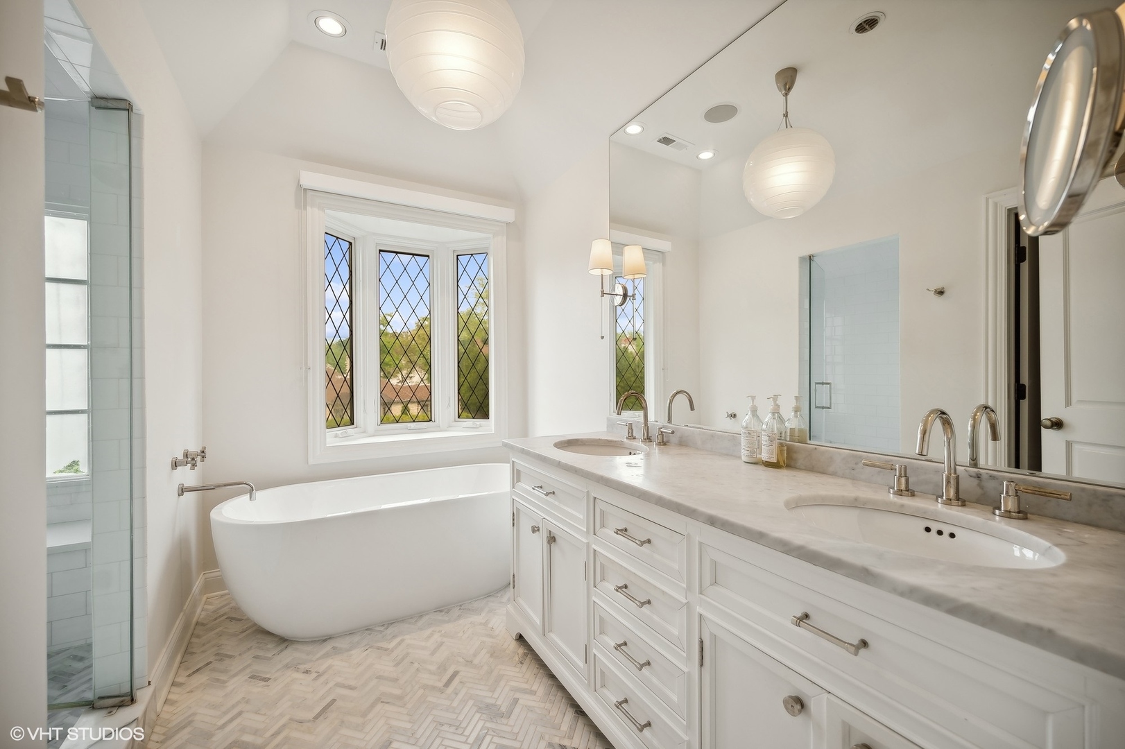 851 Sheridan Road Winnetka, IL 60093 - Photo 43 of 66 a bathroom with a granite countertop sink mirror and bathtub