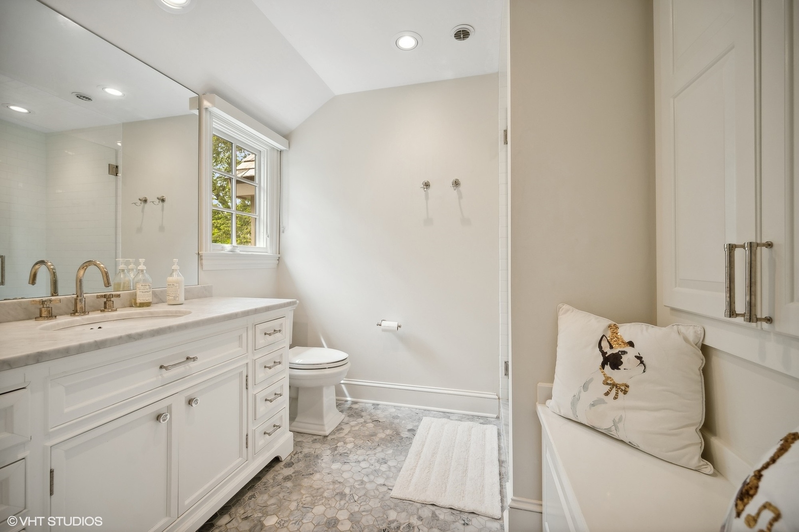 851 Sheridan Road Winnetka, IL 60093 - Photo 47 of 66 a spacious bathroom with a granite countertop sink mirror and toilet