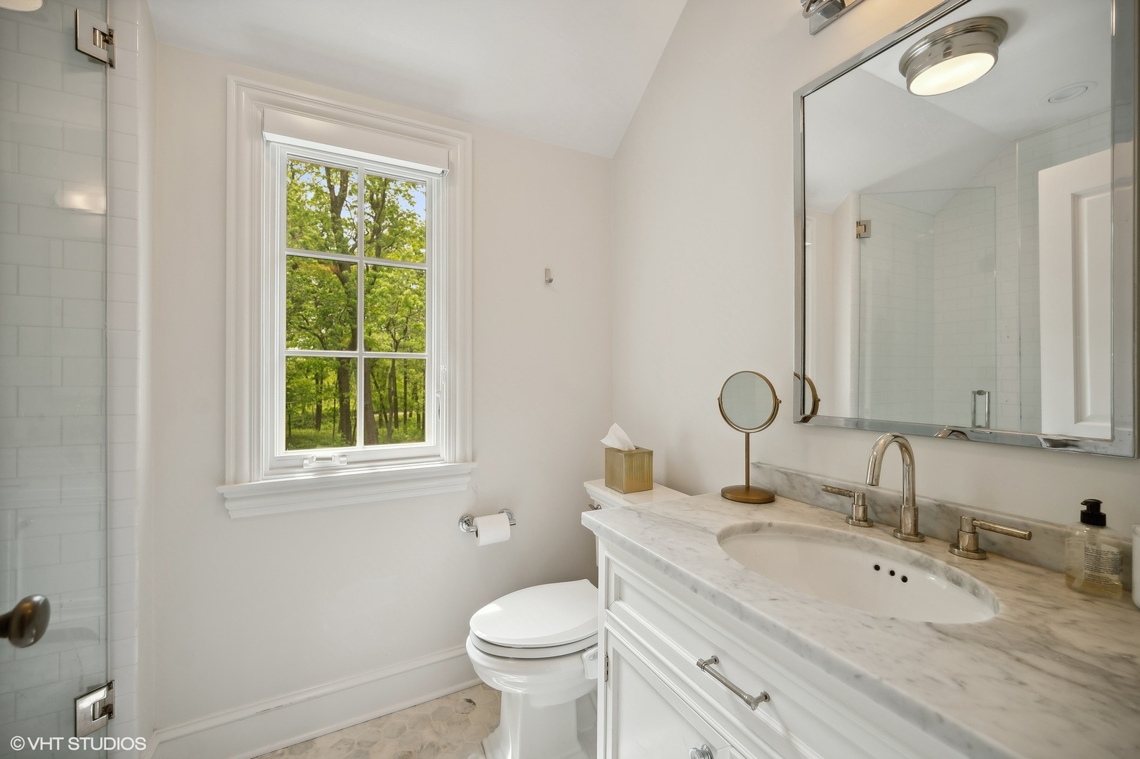851 Sheridan Road Winnetka, IL 60093 - Photo 49 of 66 a bathroom with a granite countertop sink and a mirror