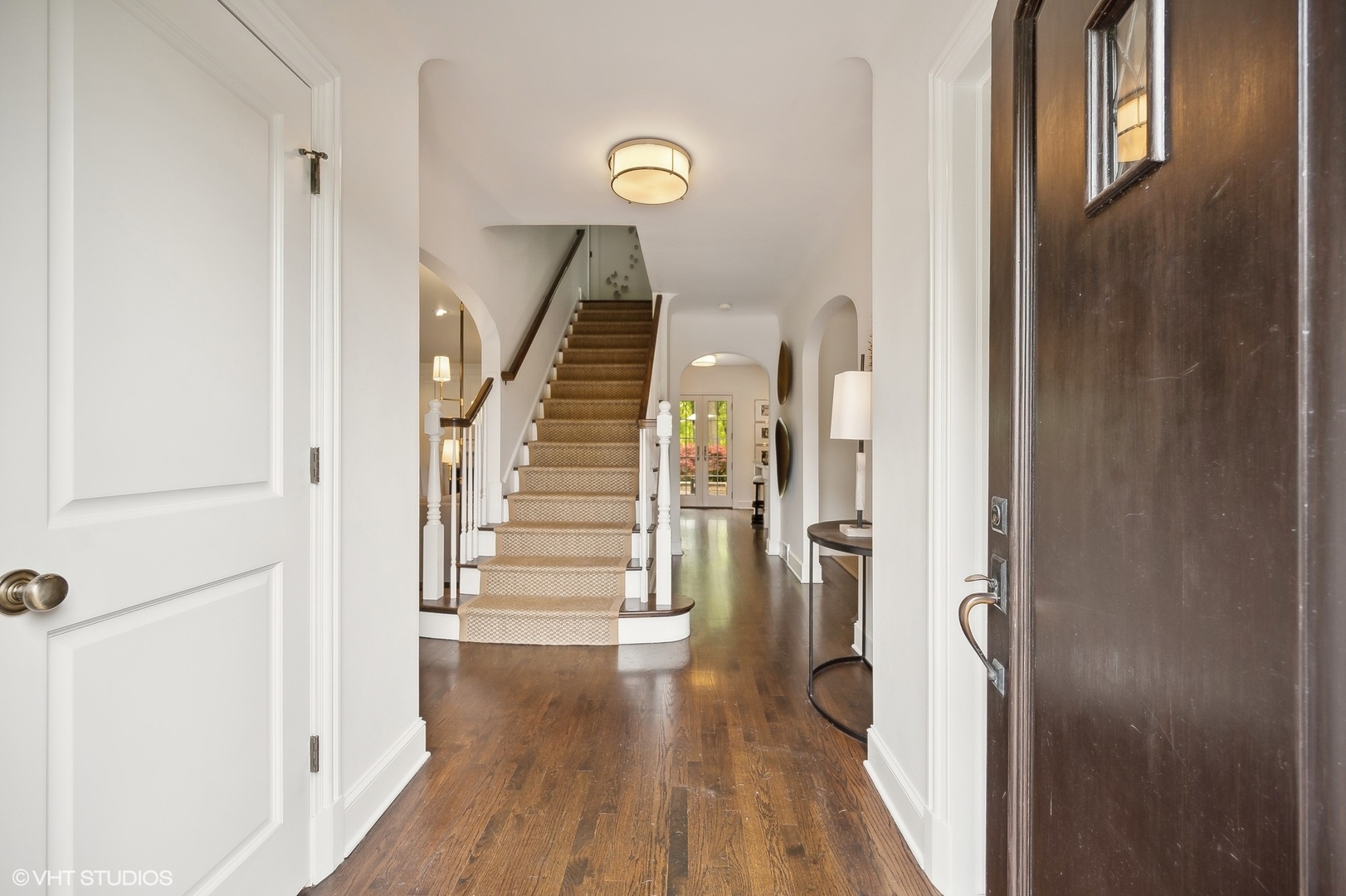 851 Sheridan Road Winnetka, IL 60093 - Photo 5 of 66 a view of entryway with wooden floor and stairs