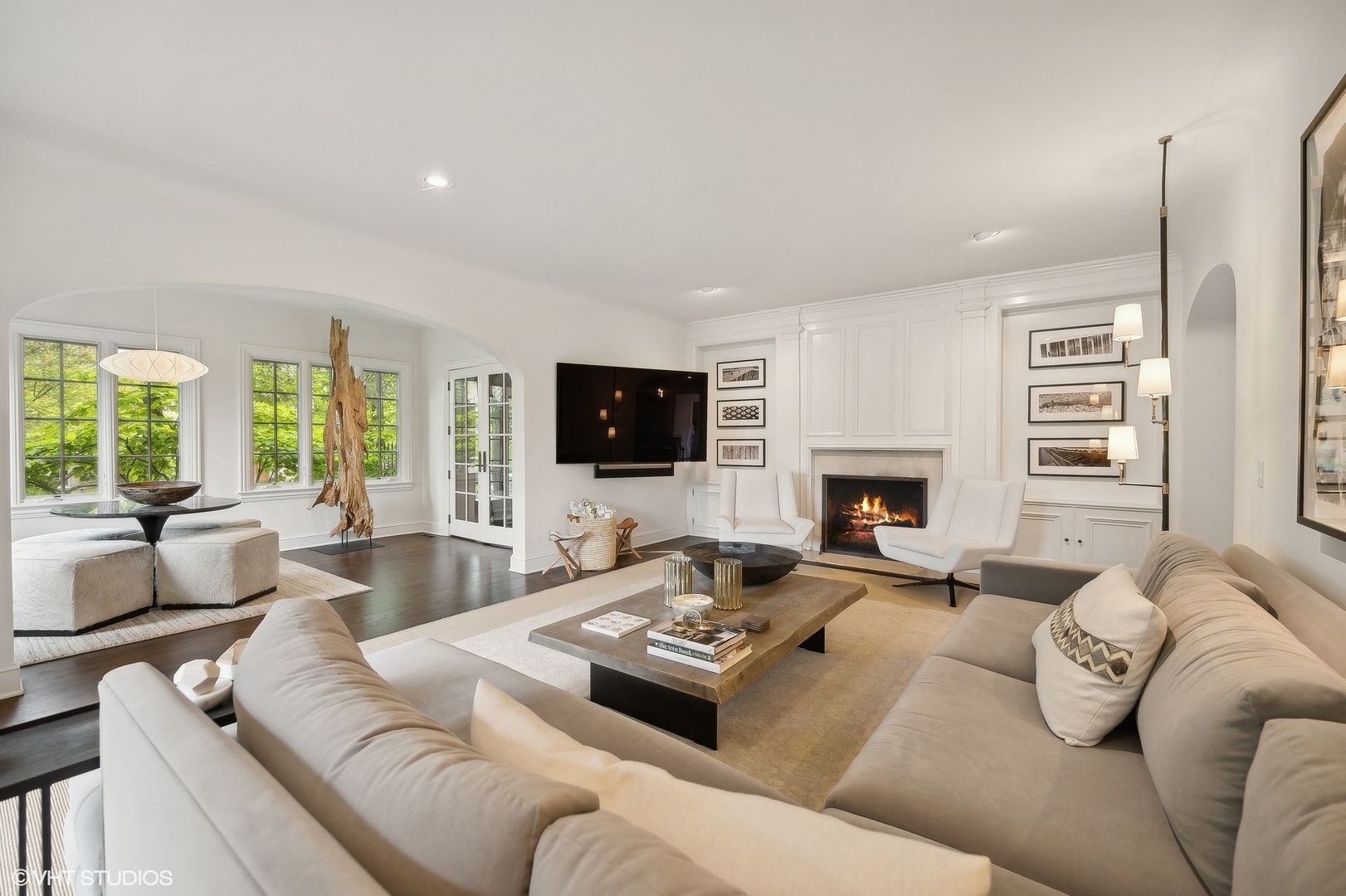 851 Sheridan Road Winnetka, IL 60093 - Photo 8 of 66 a living room with furniture a flat screen tv and a fireplace