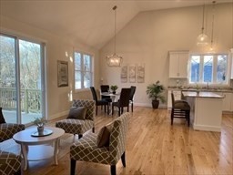 70 Oswego Street Bellingham, MA 02019 - Photo 20 of 28 a living room with furniture and wooden floor