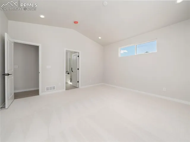 an empty room with an entryway