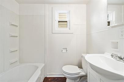915 2nd Street McKees Rocks, PA 15136 - Photo 14 of 17 a bathroom with a sink toilet and bathtub