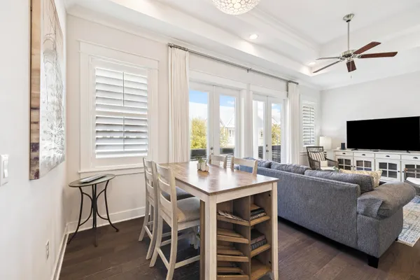 a view of a dining room with furniture window and outside view