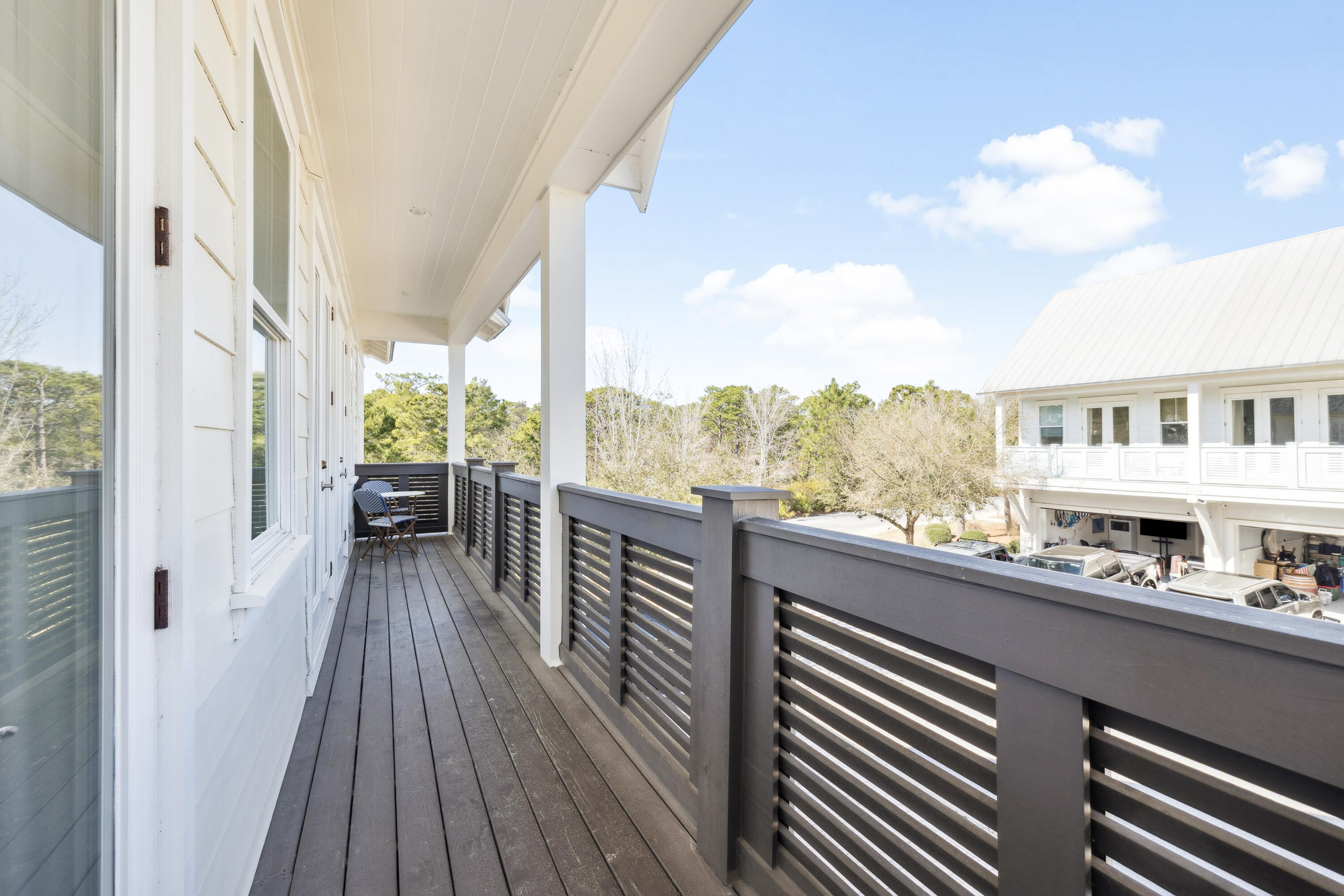 103 Milestone Dr Inlet Beach, Unit C Inlet Beach, FL 32461 - Photo 10 of 31 a view of balcony with furniture