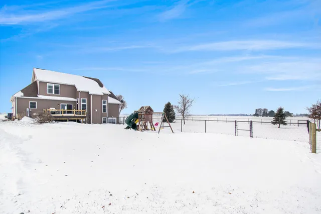 a view of a road with a building in the background