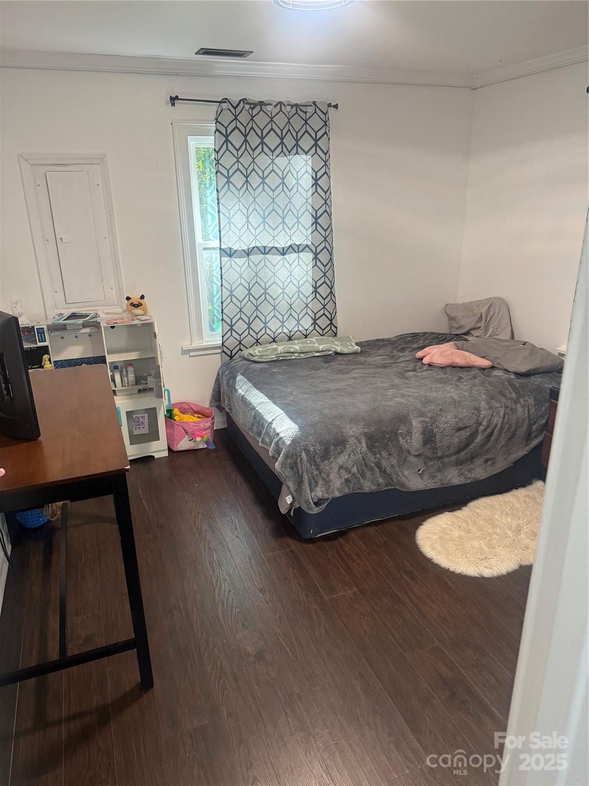 1473 Polk Ford Road Stanfield, NC 28163 - Photo 3 of 7 a bedroom with a bed and a window