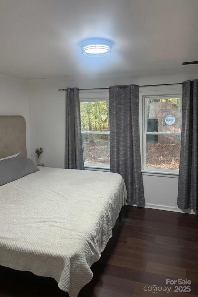 1473 Polk Ford Road Stanfield, NC 28163 - Photo 4 of 7 a bedroom with a bed and window