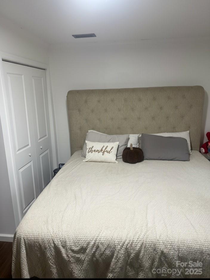 1473 Polk Ford Road Stanfield, NC 28163 - Photo 5 of 7 a bedroom with a bed and a couch