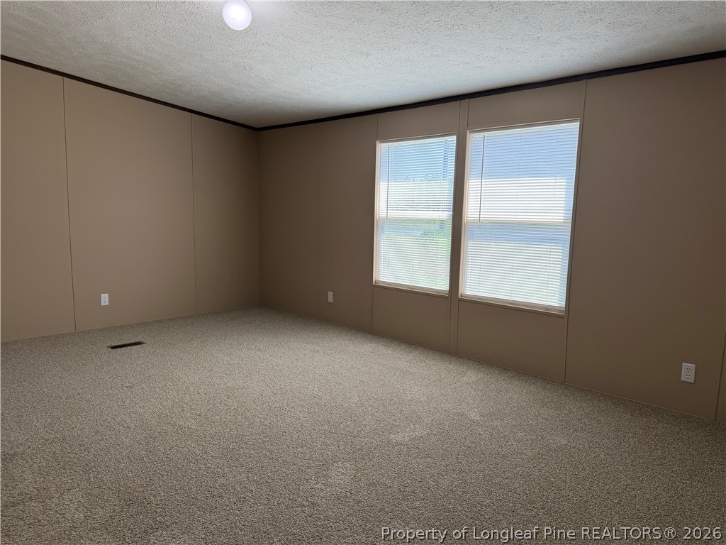 4339 Saddletree Road Lumberton, NC 28360 - Photo 15 of 23 an empty room with a window