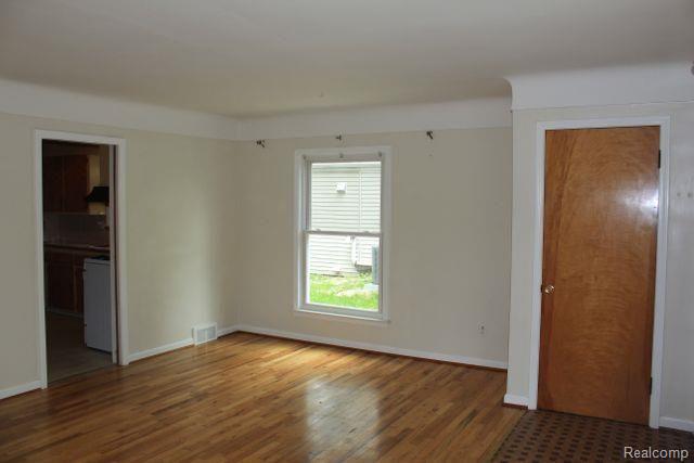 3122 Trafford Road Royal Oak, MI 48073 - Photo 10 of 18 ALL OF THE WOOD FLOORS WERE REFINISHED IN 2010. CHECK THE COVED CEILINGS