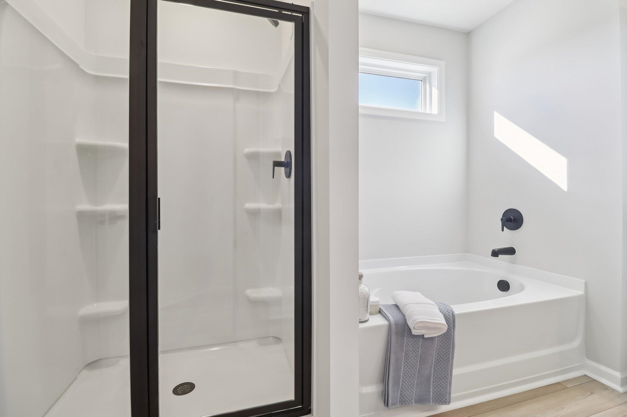 704 Bramble Way Conway, SC 29527 - Photo 9 of 17 Full bath with double vanity and light wood-style floors