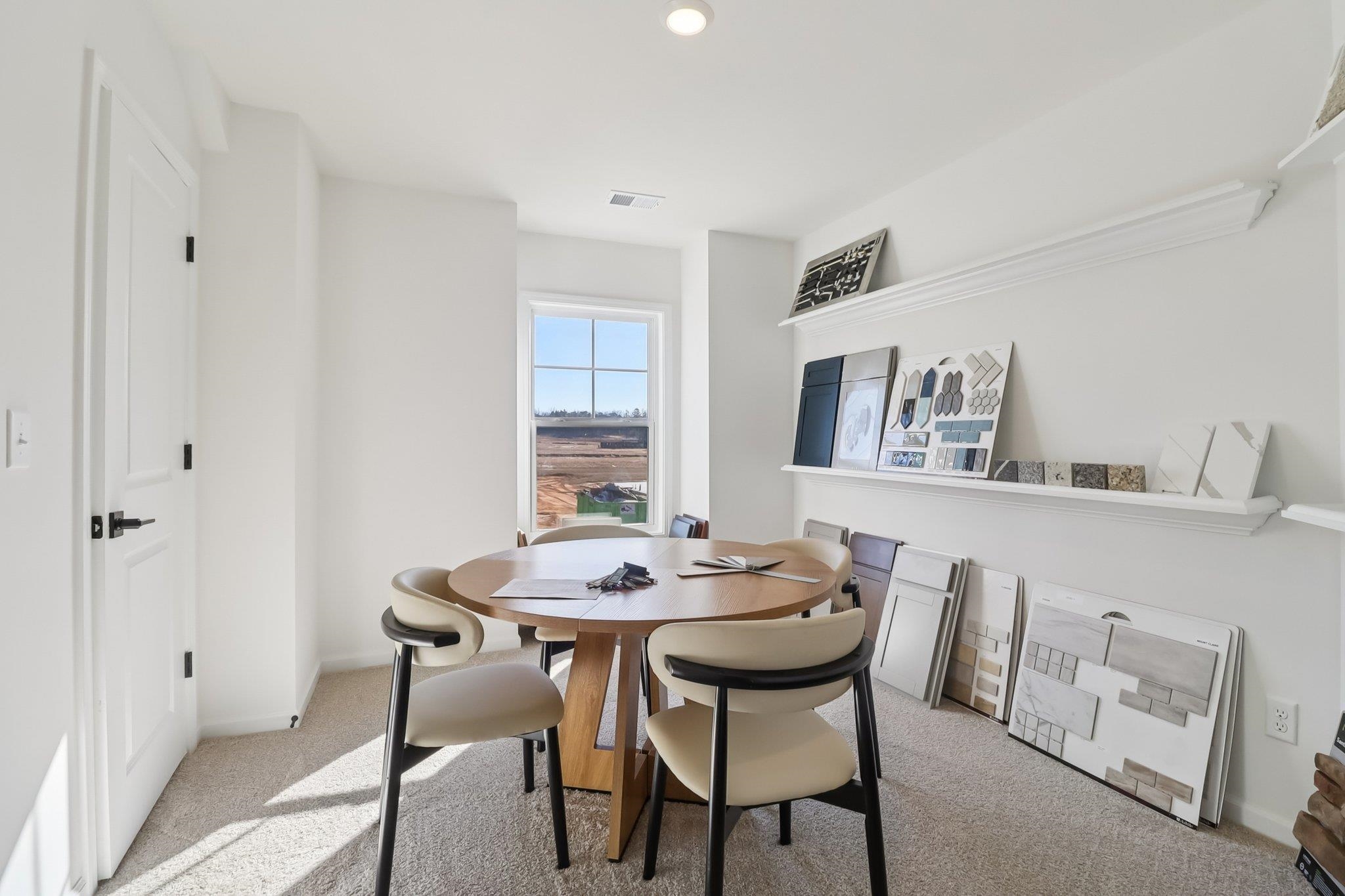 704 Bramble Way Conway, SC 29527 - Photo 12 of 17 Staircase featuring carpet and a chandelier